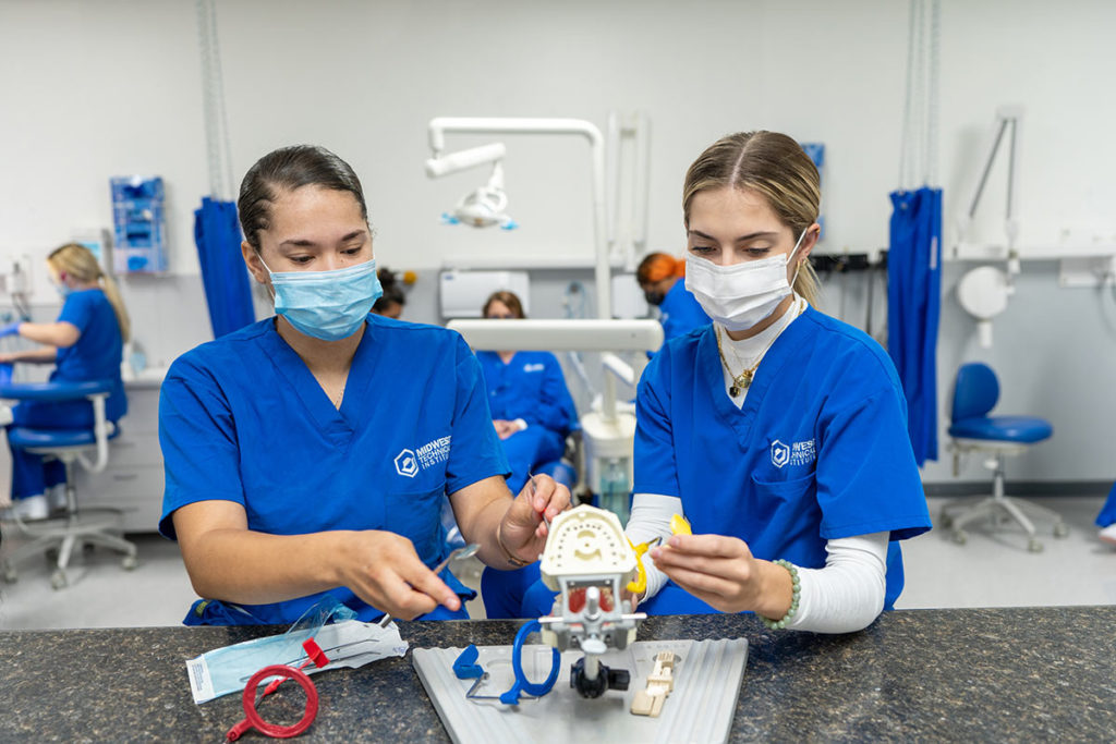 Dental Assisting Program Students Practicing Their Skills