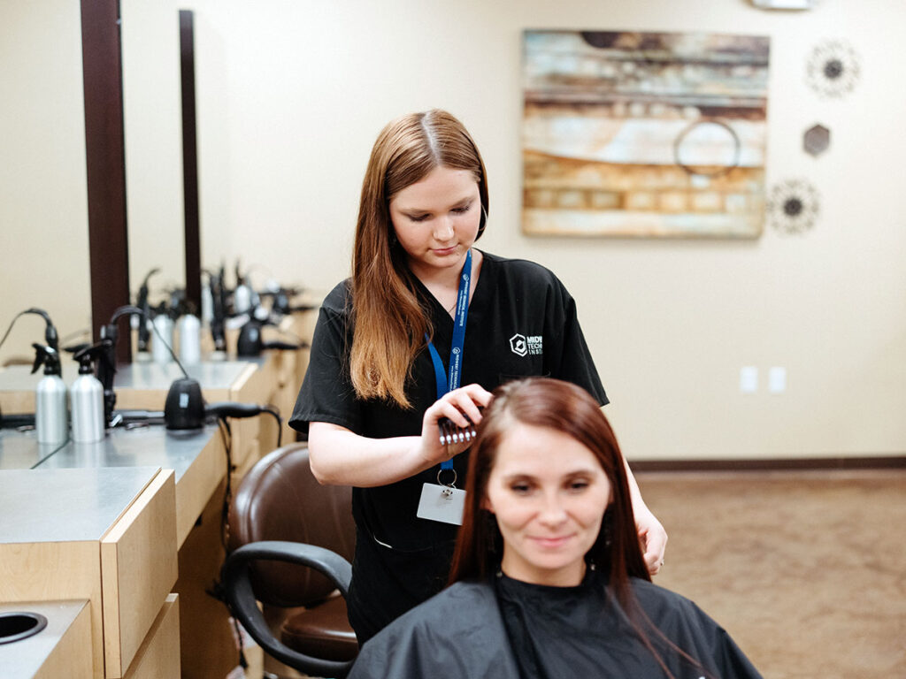 Cosmetology Program Student Cutting Hair