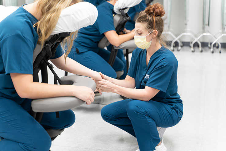 Massage Therapy Program Students Practicing Their Skills