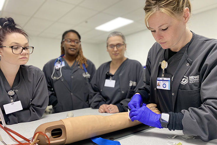 Phlebotomy Course Students Drawing Blood